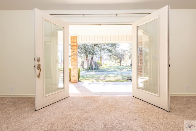 entryway with carpet