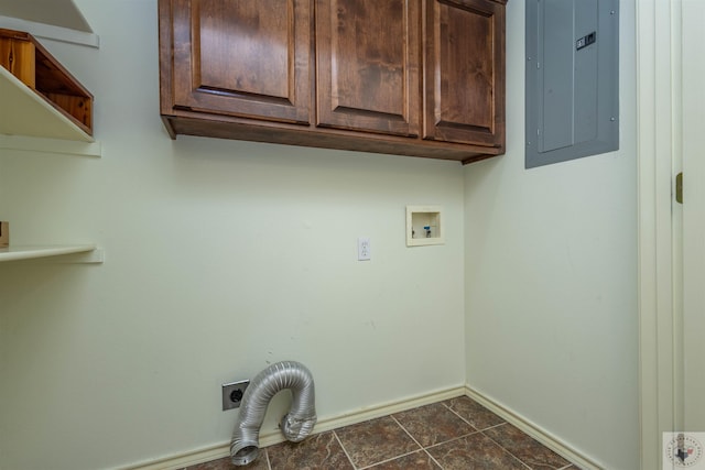 laundry room featuring baseboards, electric panel, hookup for a washing machine, cabinet space, and hookup for an electric dryer