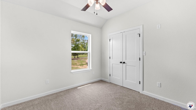 206 Spencer St, Maud, TX 75567 - unfurnished bedroom featuring carpet flooring, lofted ceiling, a closet, and ceiling fan