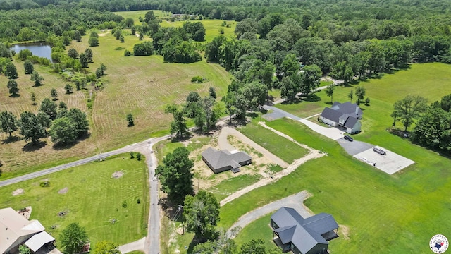 206 Spencer St, Maud, TX 75567 - aerial view of a nearby body of water and a heavily wooded area