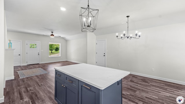206 Spencer St, Maud, TX 75567 - kitchen featuring a chandelier, dark wood-type flooring, open floor plan, and lofted ceiling