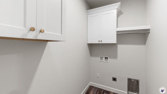 206 Spencer St, Maud, TX 75567 - washroom featuring cabinet space, hookup for a washing machine, electric dryer hookup, and dark wood-style flooring