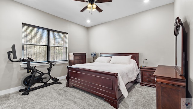 bedroom with a ceiling fan, recessed lighting, light colored carpet, and baseboards