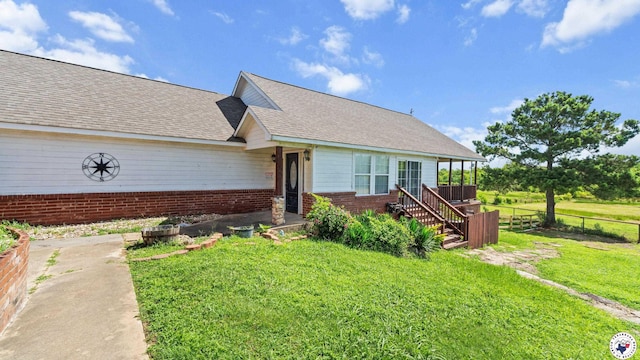 1142 Oakridge Dr, Texarkana, TX 75503 - view of front facade with brick siding and roof with shingles