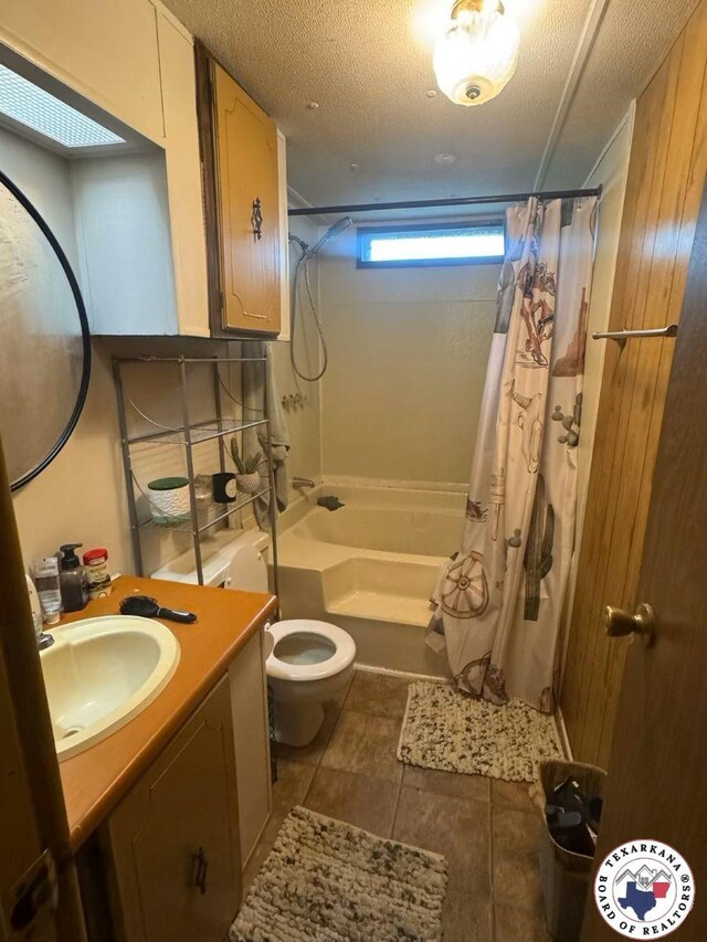10720W.7TH Trexler Rd, Texarkana, TX 75501 - full bathroom featuring shower / bath combo, vanity, and toilet