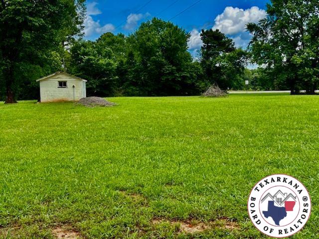 10720W.7TH Trexler Rd, Texarkana, TX 75501 - view of green lawn