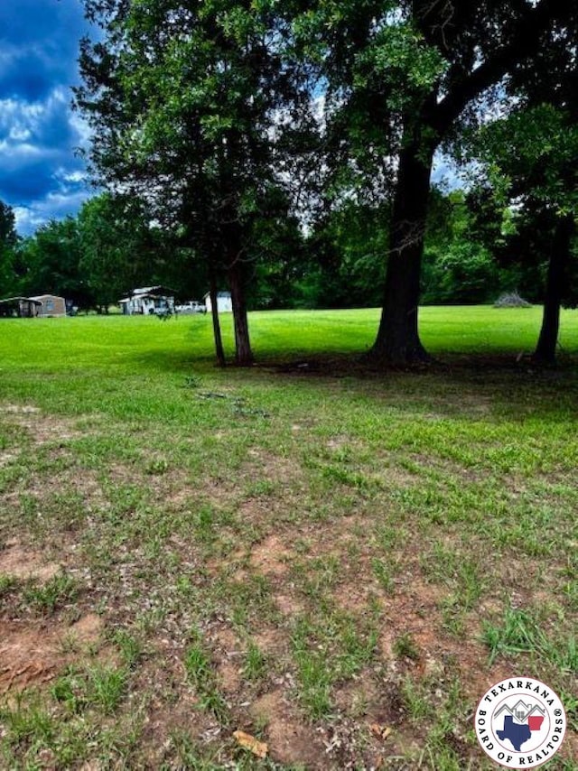 10720W.7TH Trexler Rd, Texarkana, TX 75501 - view of grassy yard