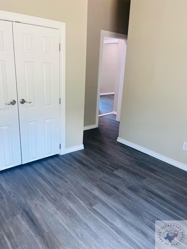 unfurnished bedroom with a closet