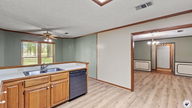 1135 Cook Rd, Texarkana, AR 71854 - kitchen featuring black dishwasher, crown molding, a textured ceiling, light wood-style floors, and brown cabinets