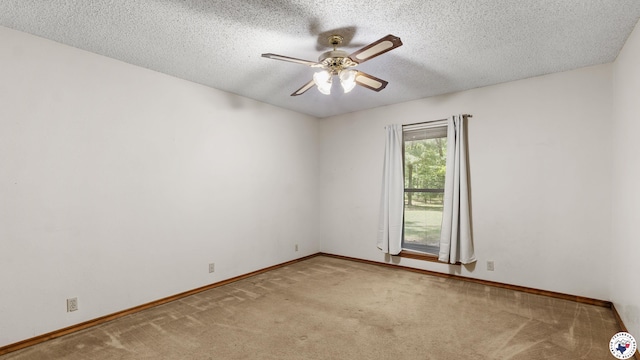 1135 Cook Rd, Texarkana, AR 71854 - carpeted spare room with ceiling fan and a textured ceiling
