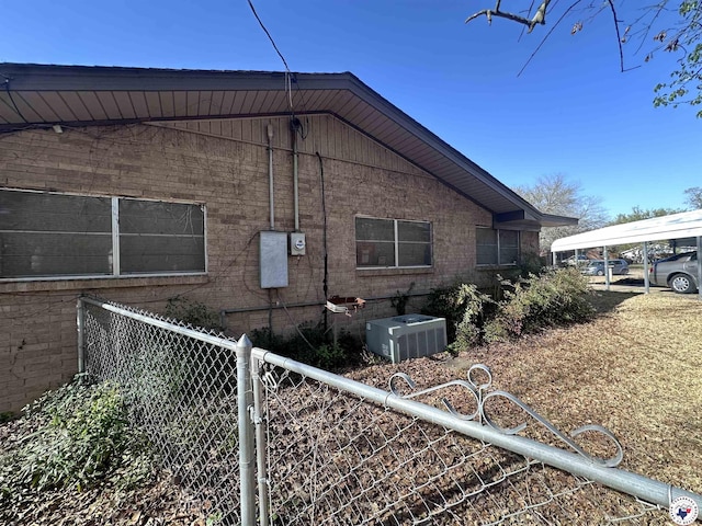 216 W Pioneer St, Wake Village, TX 75501 - view of home's exterior featuring central air condition unit and fence