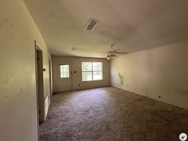 216 W Pioneer St, Wake Village, TX 75501 - carpeted spare room featuring a textured ceiling and ceiling fan