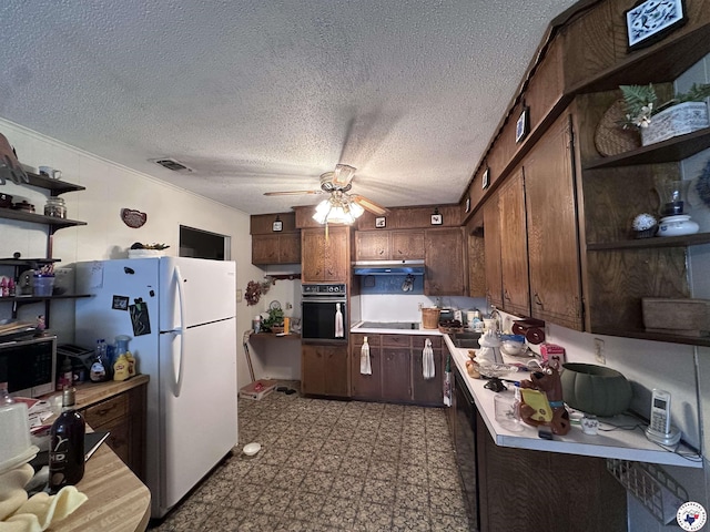216 W Pioneer St, Wake Village, TX 75501 - kitchen featuring black appliances, open shelves, light flooring, a ceiling fan, and light countertops