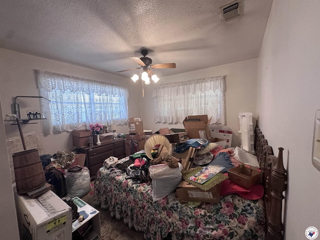 216 W Pioneer St, Wake Village, TX 75501 - bedroom with a ceiling fan and a textured ceiling