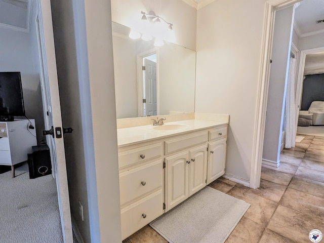 3815 Wyatt Ln, Texarkana, TX 75503 - bathroom featuring crown molding, vanity, and baseboards