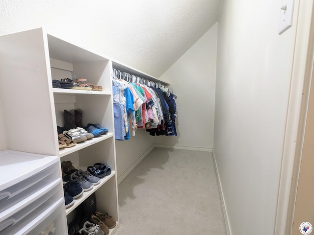 3815 Wyatt Ln, Texarkana, TX 75503 - walk in closet with carpet and vaulted ceiling