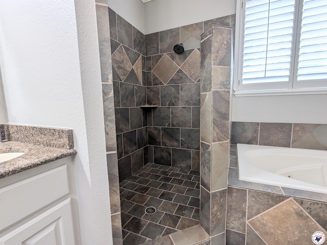 3815 Wyatt Ln, Texarkana, TX 75503 - full bathroom featuring a garden tub, tiled shower, and vanity