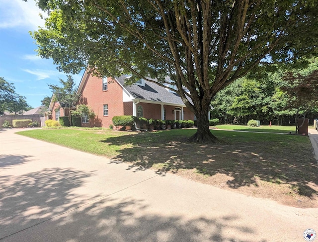 3815 Wyatt Ln, Texarkana, TX 75503 - view of front facade featuring brick siding