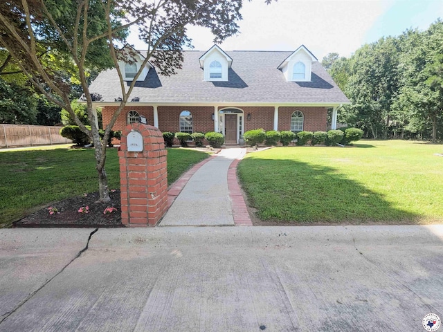 3815 Wyatt Ln, Texarkana, TX 75503 - cape cod-style house featuring brick siding and roof with shingles