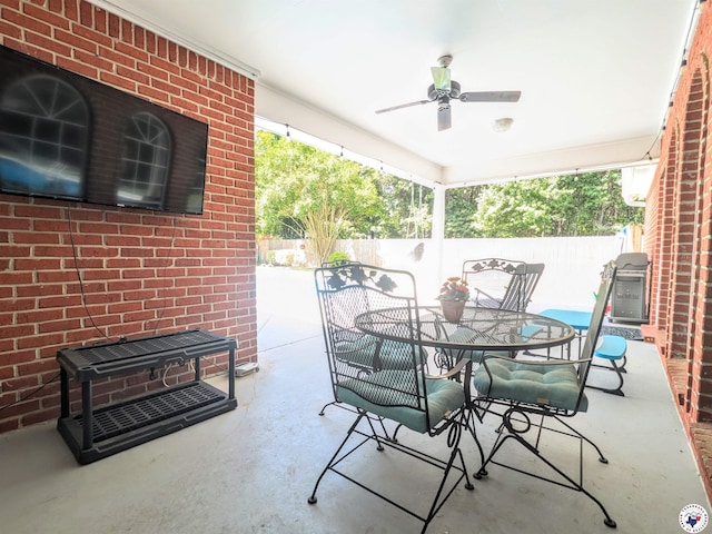 3815 Wyatt Ln, Texarkana, TX 75503 - view of patio / terrace featuring outdoor dining area, ceiling fan, and area for grilling