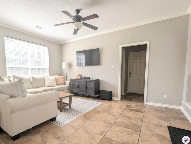 3815 Wyatt Ln, Texarkana, TX 75503 - living room with ornamental molding, a ceiling fan, a textured ceiling, and baseboards