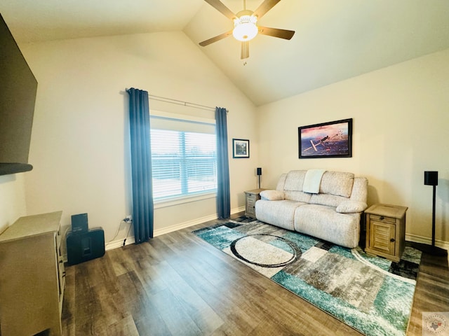 living area with vaulted ceiling, baseboards, ceiling fan, and wood finished floors