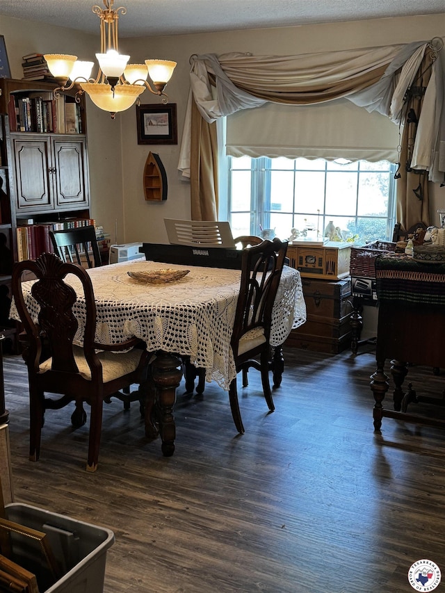 3811 Potomac Ave, Texarkana, TX 75501 - dining room with dark wood-style flooring and a chandelier