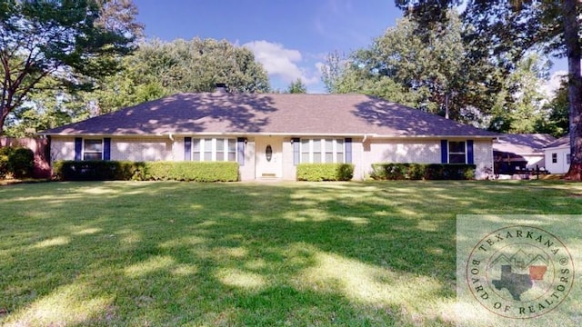 ranch-style house with a front yard