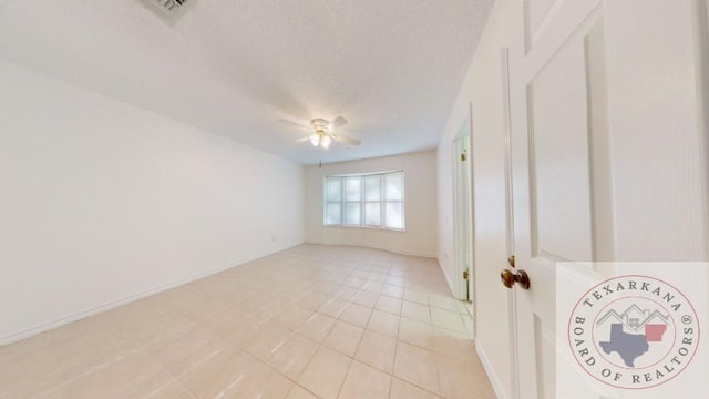 unfurnished room featuring ceiling fan