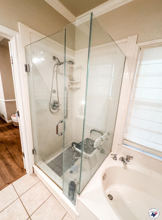 25 County Road 1905, Linden, TX 75563 - bathroom with a garden tub, a stall shower, and tile patterned flooring