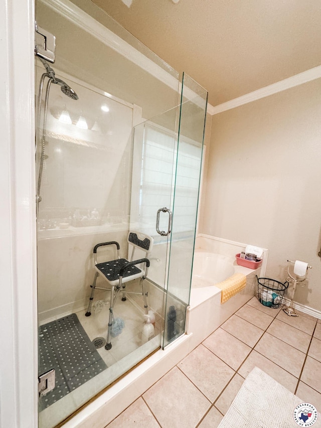 25 County Road 1905, Linden, TX 75563 - bathroom with a shower stall, tile patterned flooring, a bath, crown molding, and baseboards