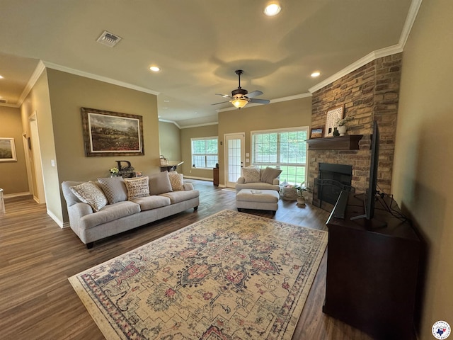 22 Heritage Blvd, Texarkana, TX 75501 - living room featuring ornamental molding, wood finished floors, recessed lighting, a ceiling fan, and a fireplace