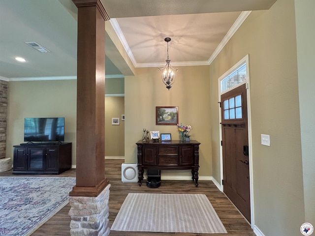 22 Heritage Blvd, Texarkana, TX 75501 - foyer with decorative columns, wood finished floors, ornamental molding, and a chandelier