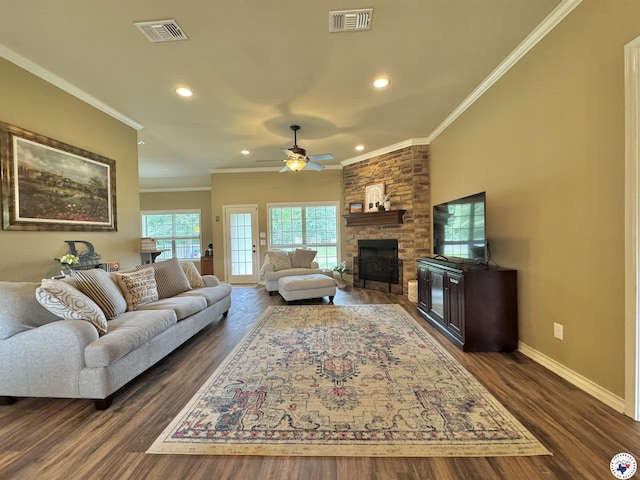 22 Heritage Blvd, Texarkana, TX 75501 - living area with a fireplace, ornamental molding, dark wood-style flooring, ceiling fan, and recessed lighting