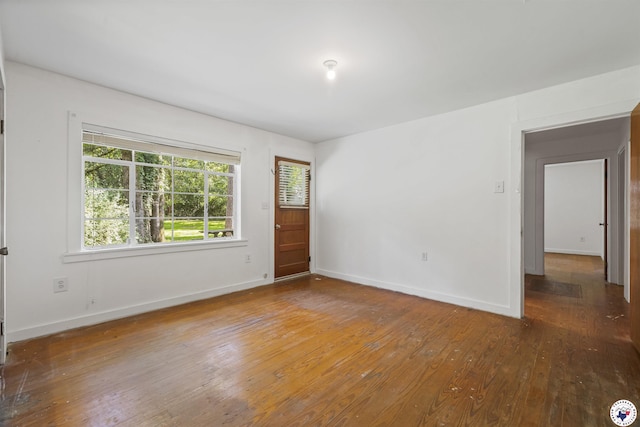 6008 E 9th St, Texarkana, AR 71854 - empty room with hardwood / wood-style flooring and baseboards