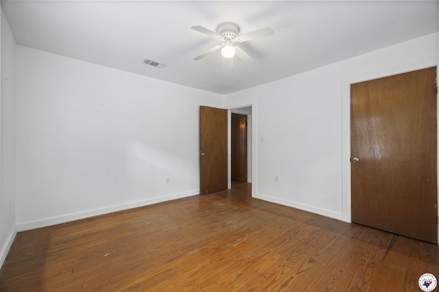 6008 E 9th St, Texarkana, AR 71854 - unfurnished bedroom with wood finished floors and ceiling fan