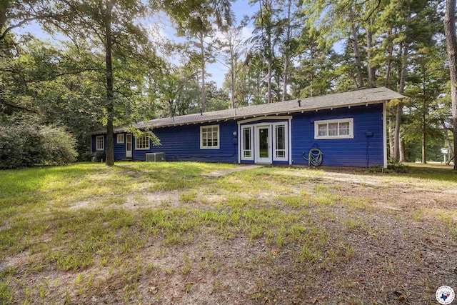6008 E 9th St, Texarkana, AR 71854 - rear view of house featuring a yard