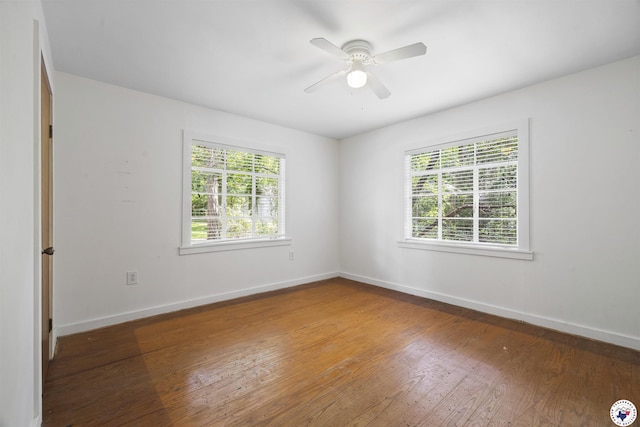 6008 E 9th St, Texarkana, AR 71854 - empty room with wood finished floors and ceiling fan
