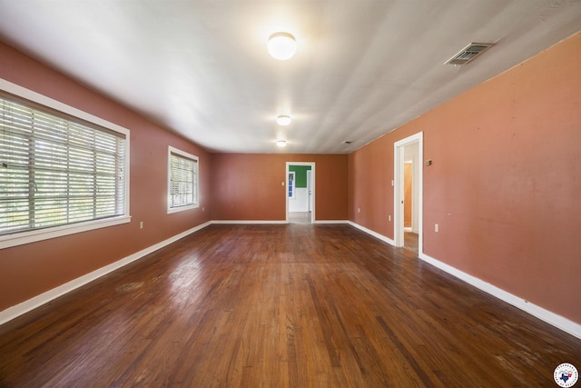 6008 E 9th St, Texarkana, AR 71854 - unfurnished room featuring dark wood finished floors and baseboards