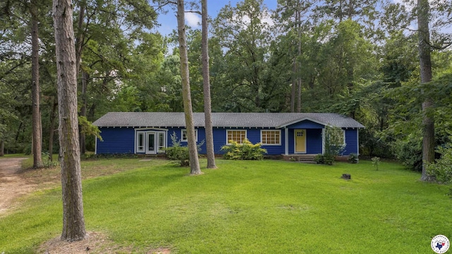 6008 E 9th St, Texarkana, AR 71854 - ranch-style house featuring a front lawn and french doors
