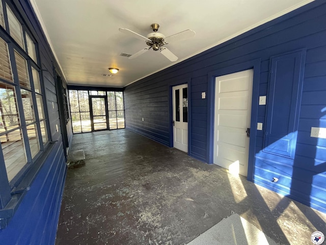 unfurnished sunroom with visible vents