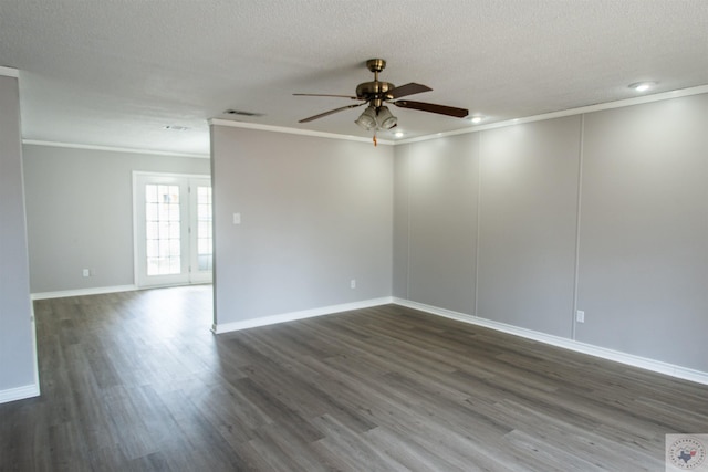 unfurnished room featuring ceiling fan, a textured ceiling, dark hardwood / wood-style flooring, and ornamental molding