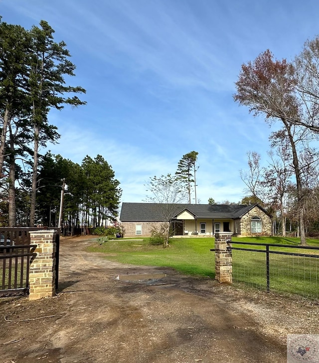 view of front of home with a front lawn