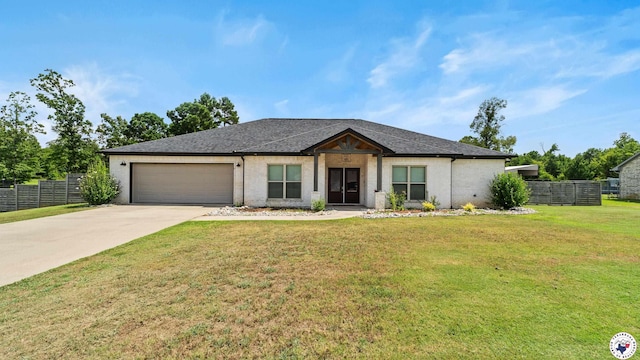 155 Lillian Ln, Texarkana, TX 75501 - view of front facade featuring a garage, driveway, roof with shingles, and brick siding