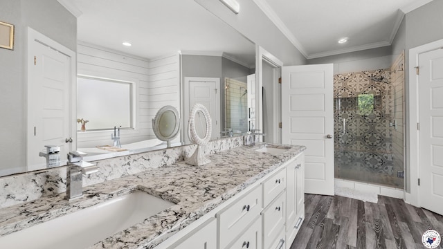 155 Lillian Ln, Texarkana, TX 75501 - full bathroom with a shower stall, double vanity, wood finished floors, plenty of natural light, and ornamental molding