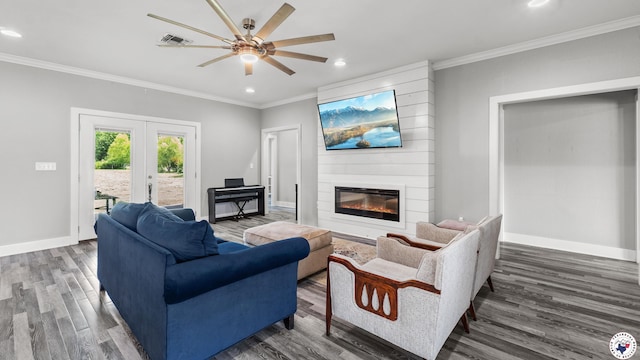 155 Lillian Ln, Texarkana, TX 75501 - living area with wood finished floors, ceiling fan, recessed lighting, crown molding, and a large fireplace