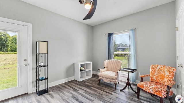 155 Lillian Ln, Texarkana, TX 75501 - living area featuring a ceiling fan, healthy amount of natural light, and wood finished floors