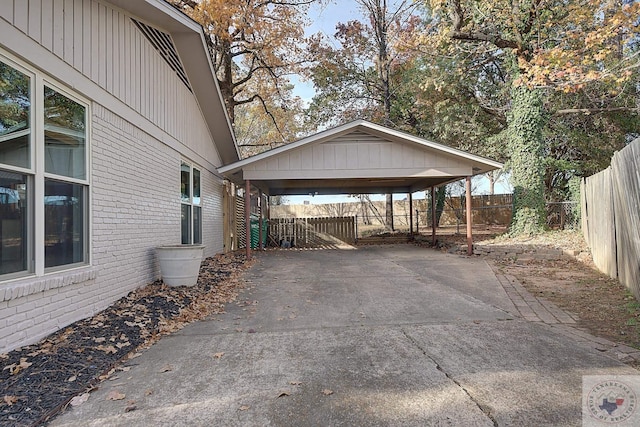 view of vehicle parking featuring a carport