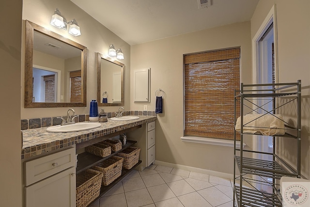 bathroom with vanity and tile patterned flooring