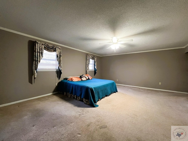 carpeted bedroom featuring ceiling fan, crown molding, and a textured ceiling